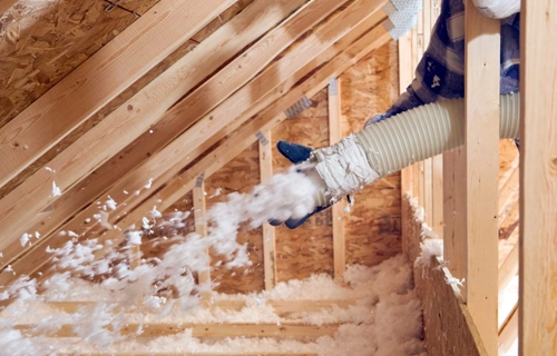 Attic insulation services with blown-in fiberglas® insulation by LP Platinum Roofing & Exteriors